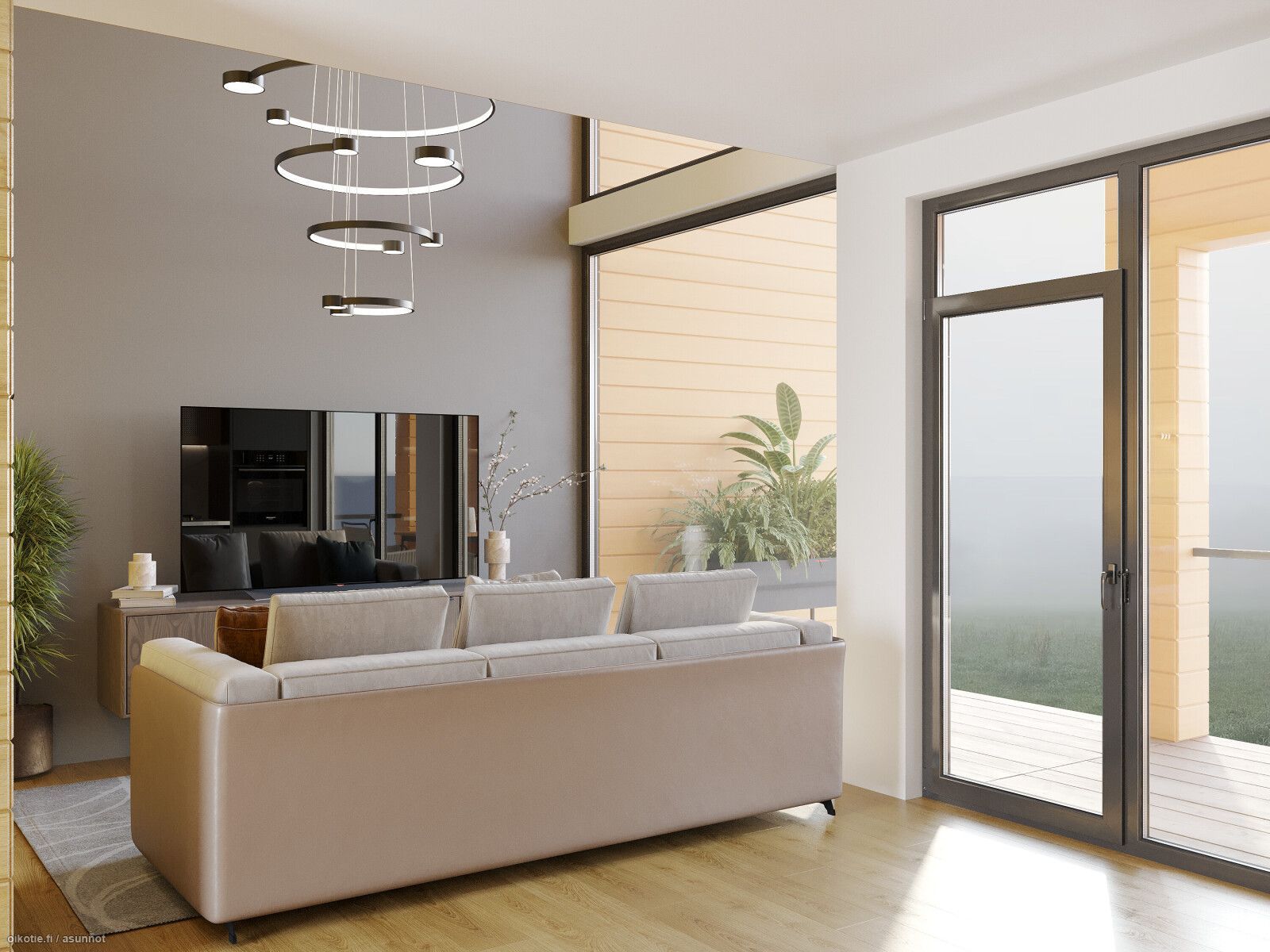 Olohuoneen sisustus, jossa on beige sohva, moderni valaisin ja suuret ikkunat, jotka tuovat luonnonvaloa.